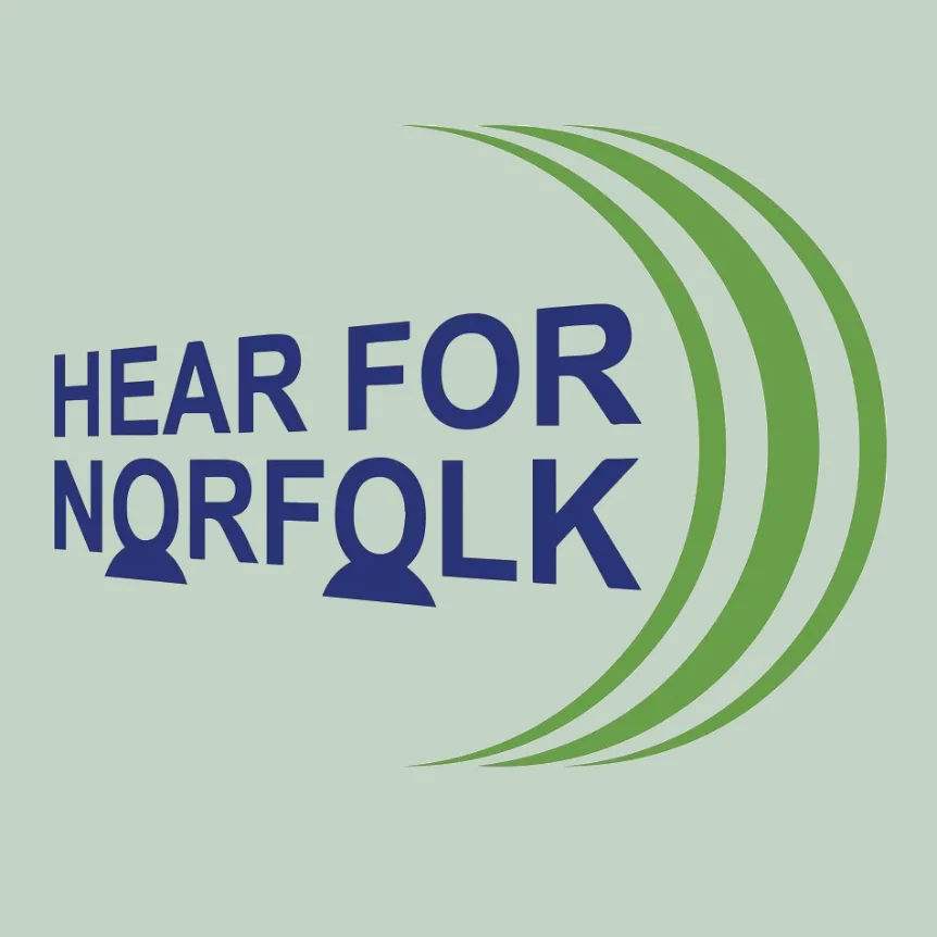 Logo with blue text reading Hear for Norfolk, featuring two head silhouettes in the letter O and three green curved lines on the right, resembling sound waves.